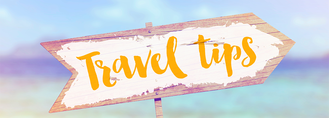 Sign Post With Travel Tips On It