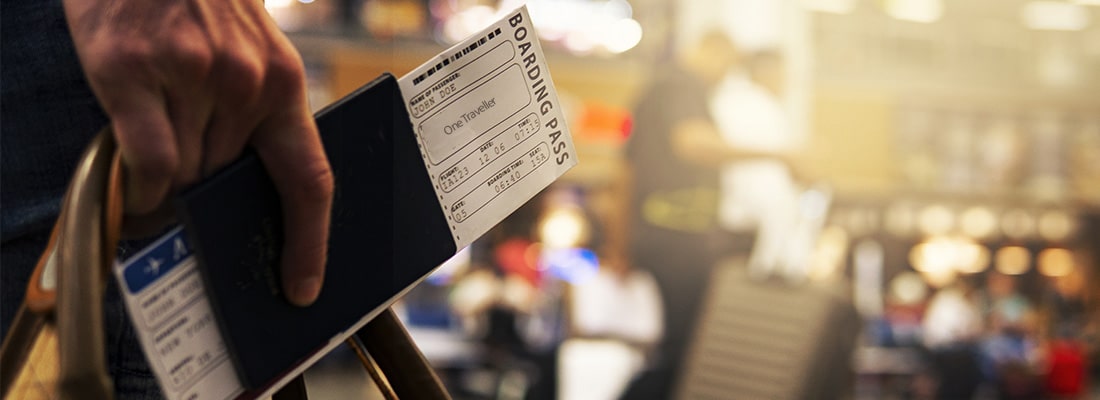 Photo of Boarding Pass and Passport