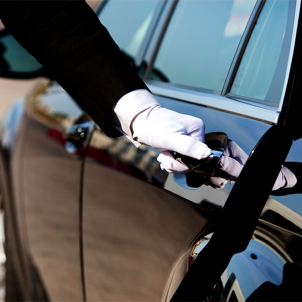 Driver Opening Door For Passengers