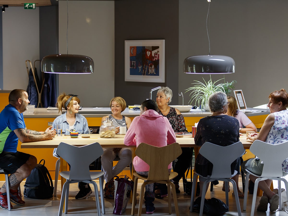 A Group Talking in Maggie's Cancer Care
